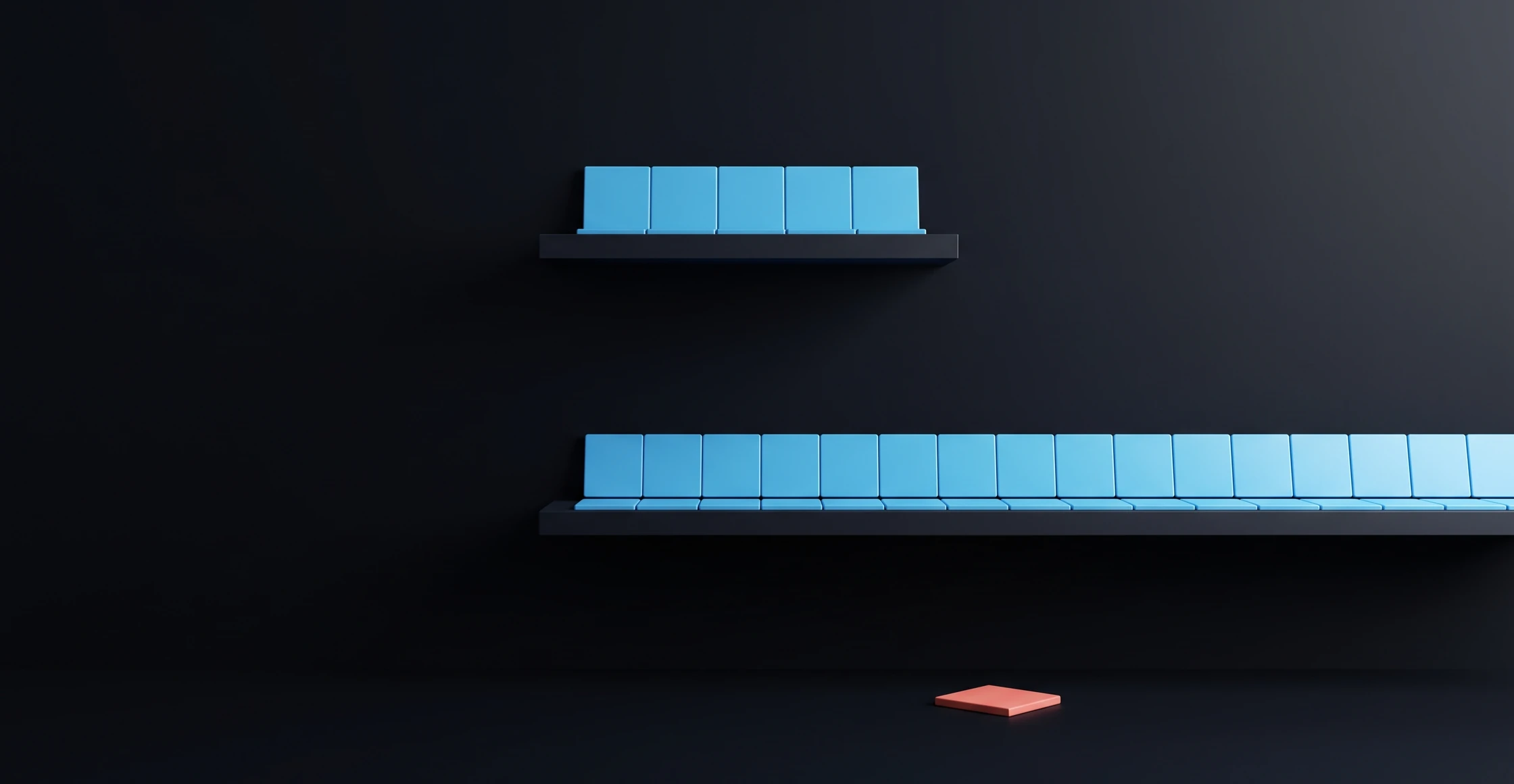 Two shelves of very different length holding the same kind of tiles, and a single coral tile lying on the ground below both
