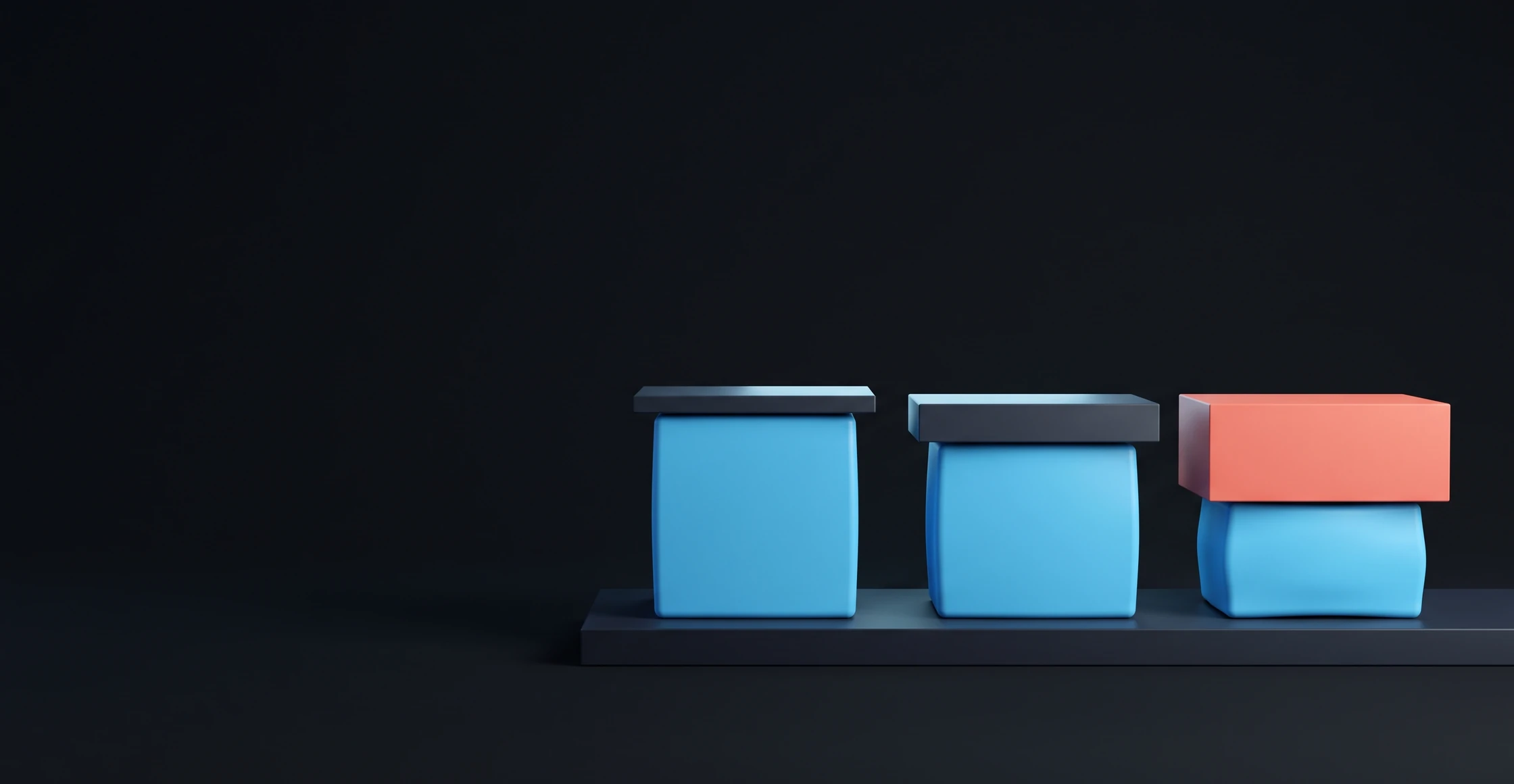 Three cubes side by side, each under a plate of different thickness; the one under the heaviest is pressed flat