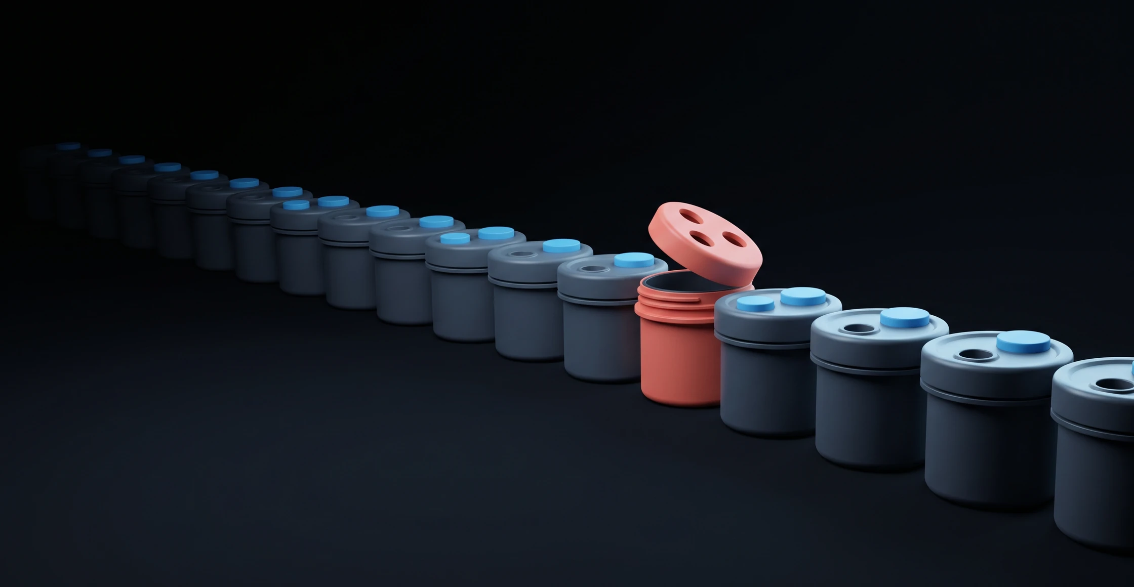 A row of small containers with seals on their lids; one stands open with its lid lifted off